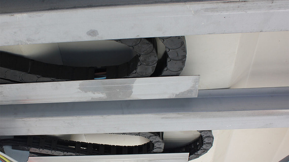 Energy chains underneath passenger boarding bridge